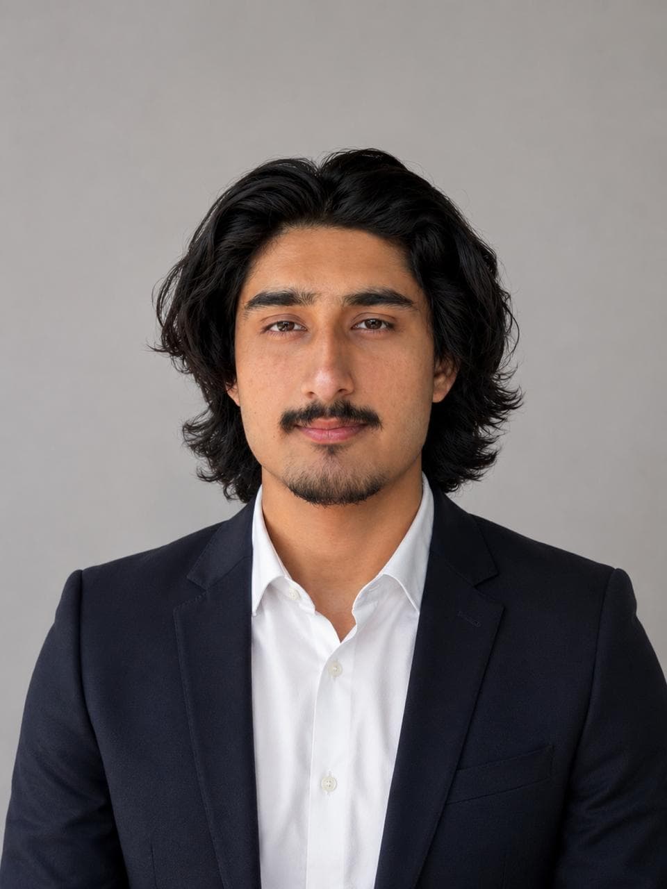 Portrait of Muhammad Ahmed, Co-founder and GEO Specialist at Peralytics